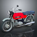 Classic Vintage Red Motorcycle With Blue Seat Black Handlebars And Silver Wheels