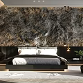 Modern Bedroom With Textured Wall Behind Bed Black Furniture White Bedding And Small Plant