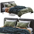 Modern Double Bed With Gray Headboard Green White Pillows And Blue Orange Blankets