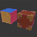 Colorful Cubes With Blue Top Yellow Pink Sides And Red Wooden Stack With Golden Corners
