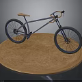 Purple Frame Bicycle With Blue Wheels And Orange Seat On Circular Wooden Platform