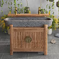 Natural Stone Washbasin with Wooden Cabinet and Hanging Plants Near Yellow Flowers