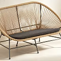 Natural Rattan Lounge Chair With Gray Cushion And Black Metal Legs