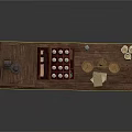 Woman Arranging Antiques On Wooden Table With Birdcage Chess Chest And Scrolls