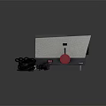 Desktoport Electronic Device With Red Knob Black Vents Lens Power Cable And Plug