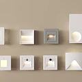 Modern Wall Lights With Various Designs In White And Gray On Beige Wall