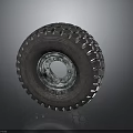 Truck Tire With Deep Tread Pattern And Metal Rim On Dark Background