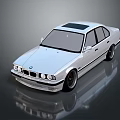 Classic White BMW Sedan With Sleek Body Lines And Black Wheels