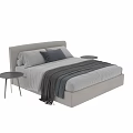 Modern Double Bed With Beige Headboard White Gray Pillows And Gray Throw Blanket