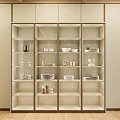 Modern Cream White Open Sideboard With Glass Doors And Displayed Bowls Plates Vases