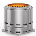 Modern Stainless Steel Stove With Cylindrical Body And Ventilation Holes