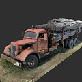 Vintage Rusty Red Truck Loaded With Large Logs On Grass