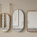 Three Stylish Mirrors with Gold and Wooden Frames Reflecting White Vase Drawing and Plant