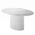 Modern White Oval Dining Table With Marble Top And Fluted Leg Design