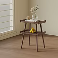 Wooden Two Tier Side Table With Vase Books And Fruits By Window