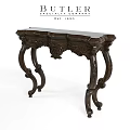 Dark Carved Wooden Table With Intricate Classic Design And Decorative Legs