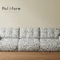 Poliform Three Seater Sofa With Black And White Pattern On Light Wall Wooden Floor