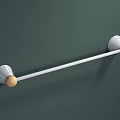 Modern Bathroom Towel Rack With White Rod And Wooden Accents On Dark Green Wall