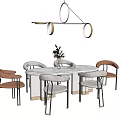 Modern Round Dining Table Set with Marble Top White Orange Chairs and Gold Pendant Light