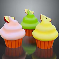 Vibrant Assorted Cupcakes with Different Colored Frostings Topped with Apple Slices and Orange Cases