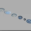 Decorative Ceramic Plates with Blue and White Patterns in Various Sizes Arranged in a Row 3d model