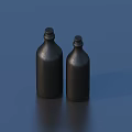 Two Stylish Black Bottles As Daily Household Items On Blue Background