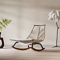 Modern Woven Wooden Rocking Chair With Feather Floor Lamp And Green Plant In Beige Room