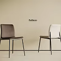 Poliform Dark Gray And White Dining Chairs With Black Metal Legs Against Light Wall