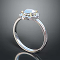 Elegant Diamond Ring With Central Stone And Small Diamonds On Silver Band