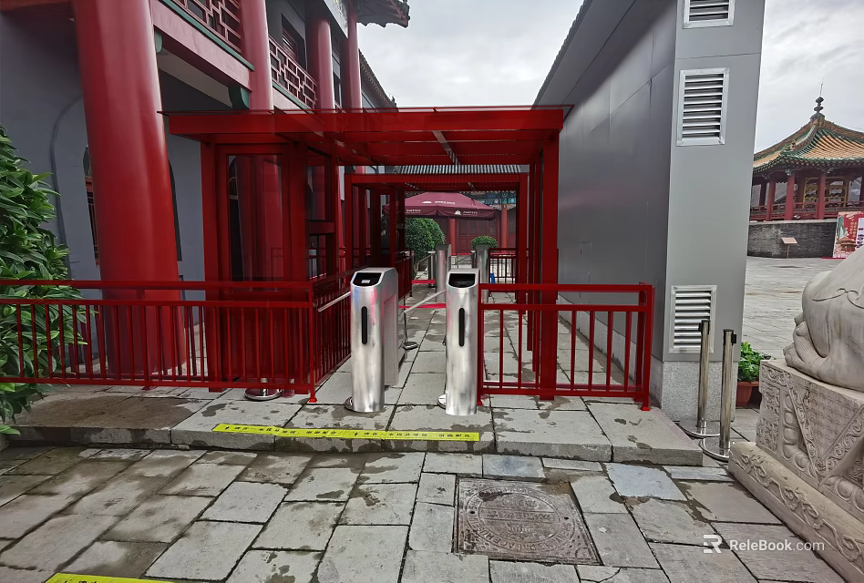 Red Architectural Turnstile Entrance With Railings Stone Pavement And Traditional Background 3d model 