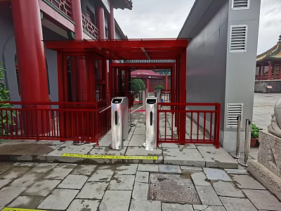 Red Architectural Turnstile Entrance With Railings Stone Pavement And Traditional Background 3d model