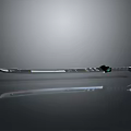Sleek Modern Metallic Sword Featuring Shiny Blade And Green Accent Design