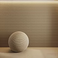 Woven Sphere Component With Textured Surface In Beige Against Textured Wall 3d model