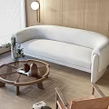 Curved White Sofa and Round Wooden Coffee Table Set with Wooden Wall and Floor Lamp