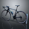 Black Road Bicycle With Curved Handlebars And White Stand On Dark Background
