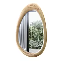 Oval Wooden Frame Mirror Reflecting Outdoor Green Plants White Chair And Gray Curtains