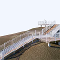Scenic Winding Pedestrian Walkway With Safety Railings And Wooden Decking On Sloped Terrain