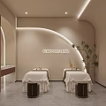 Elegant Modern Beauty Salon Reception Area With Curved Lighted Desk And Marble Product Display Wall