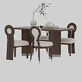 Modern Wooden Dining Table With Upholstered Chairs Decorative Vase And Books
