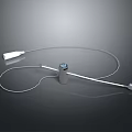 Modern Wireless Headphones and Speakers With Sleek White Silver Design and Connecting Cable