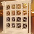 White Columns With Intricate Lattice Design Against Golden Sunset Sky