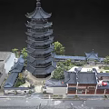 Traditional Chinese Ancient Architecture with Multi Tiered Tower Curved Roofs Surrounding Buildings and Green Trees