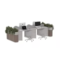 Modern Office Desk Setup With Laptop iMac Green Plants And Ergonomic Chairs