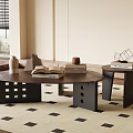 Modern Coffee Table With Open Book Stacked Books Vase And Geometric Decor On Patterned Rug