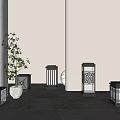 Various Square Japanese Outdoor Lights With Carved Patterns Emitting Warm Glow In Garden