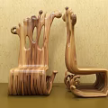Wooden Single Chair Featuring Unique Curved Design And Natural Texture Against Light Colored Wall