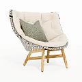 Accent Chair with Beige Cushion Black Patterned Trim Green Pillow and Wooden Legs
