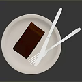 Delicious Slice of Rich Chocolate Cake on White Plate with Knife and Fork