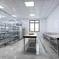 Modern Commercial Kitchen Interior With Stainless Steel Equipment And Cooking Workbench