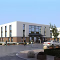 Modern Industrial Factory Building Exterior Featuring Glass Windows Parking Area And Landscaping